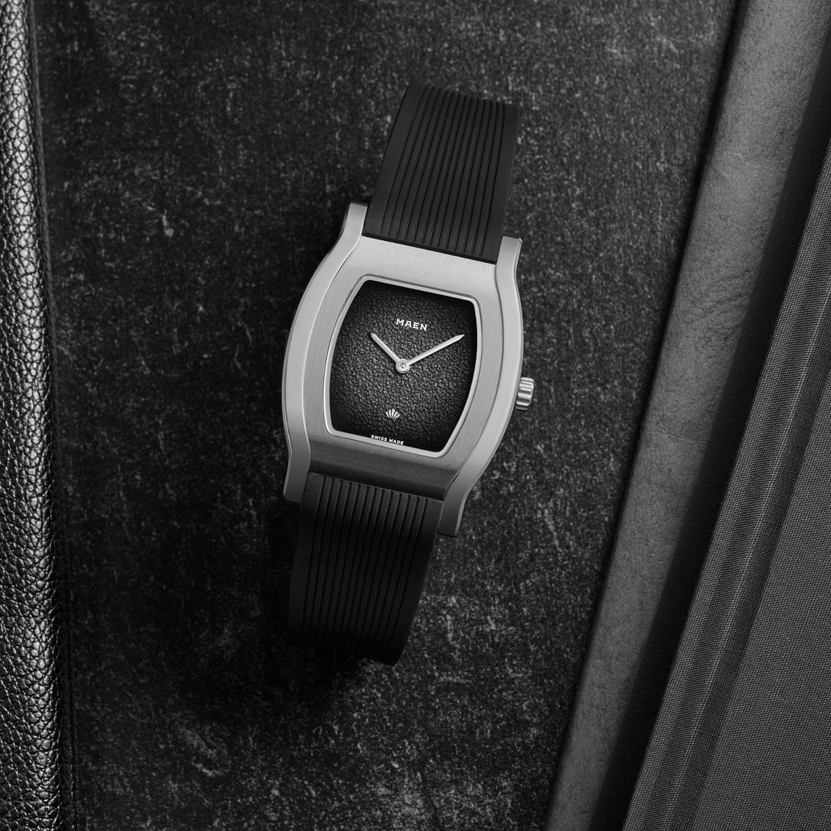 Grand Tonneau Ultra-Thin MNL.04 Black Fumé on its rubber strap, seen from above