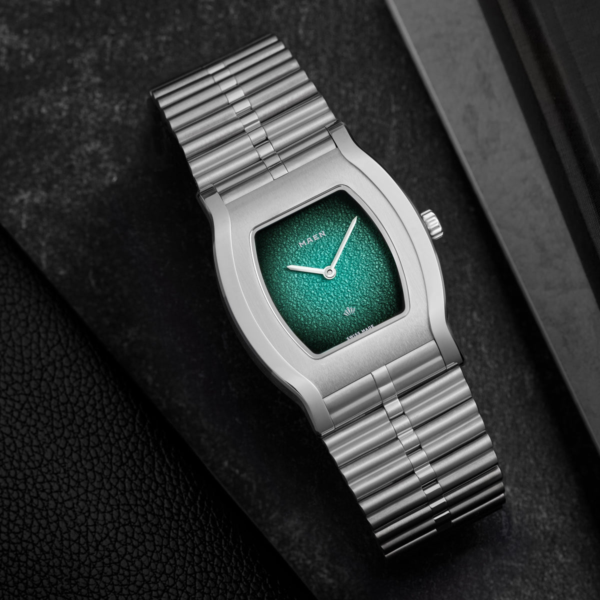 Grand Tonneau Ultra-Thin MNL.07 Turquoise Fumé on the bamboo bracelet