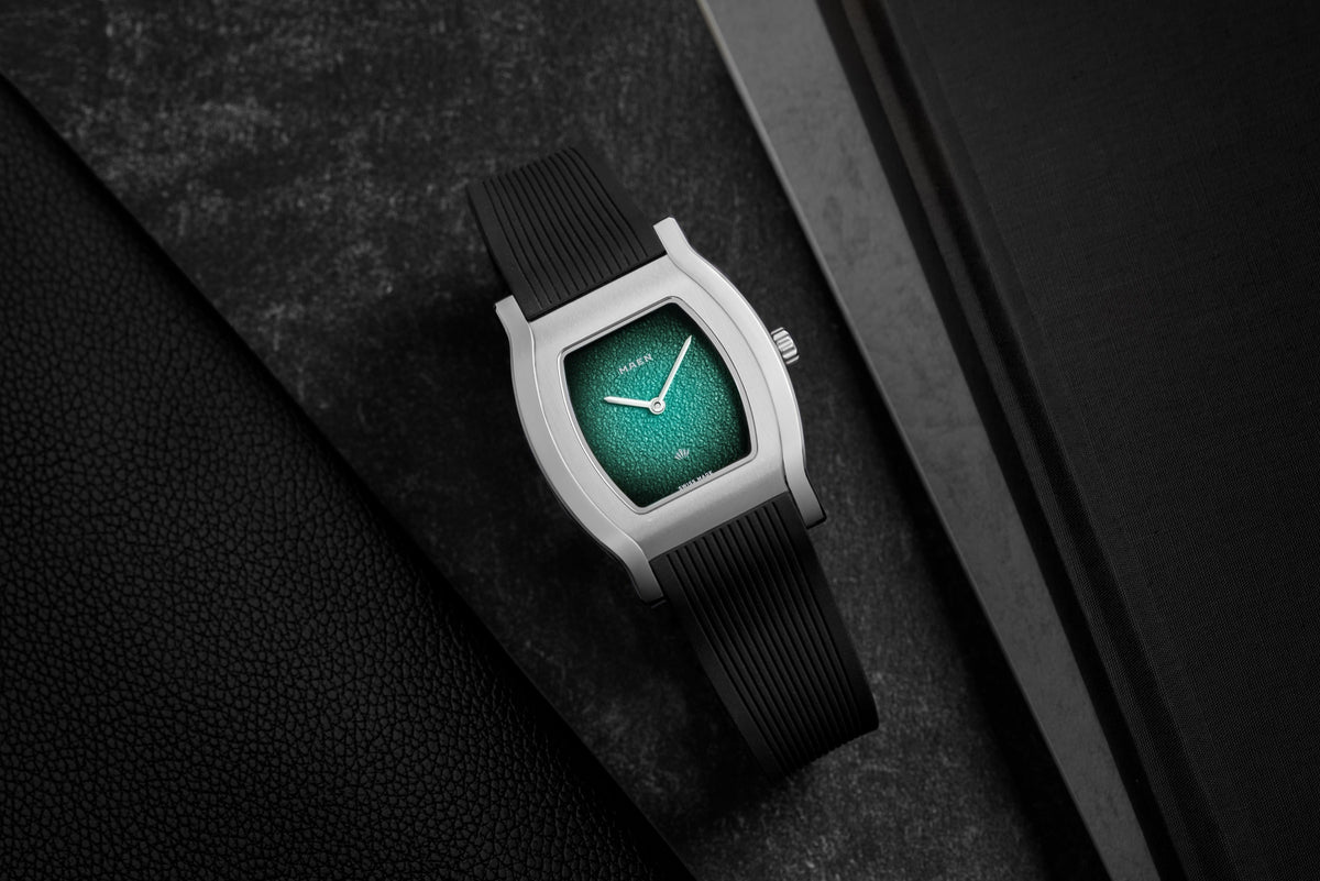 Grand Tonneau Ultra-Thin MNL.07 Turquoise Fumé on its rubber strap