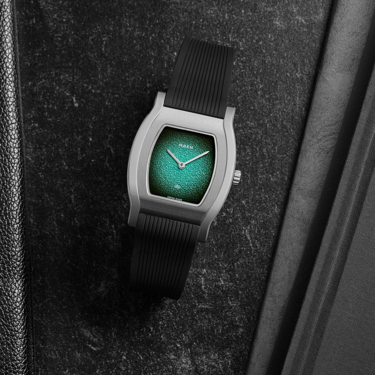 Grand Tonneau Ultra-Thin MNL.07 Turquoise Fumé on its rubber strap, seen from above
