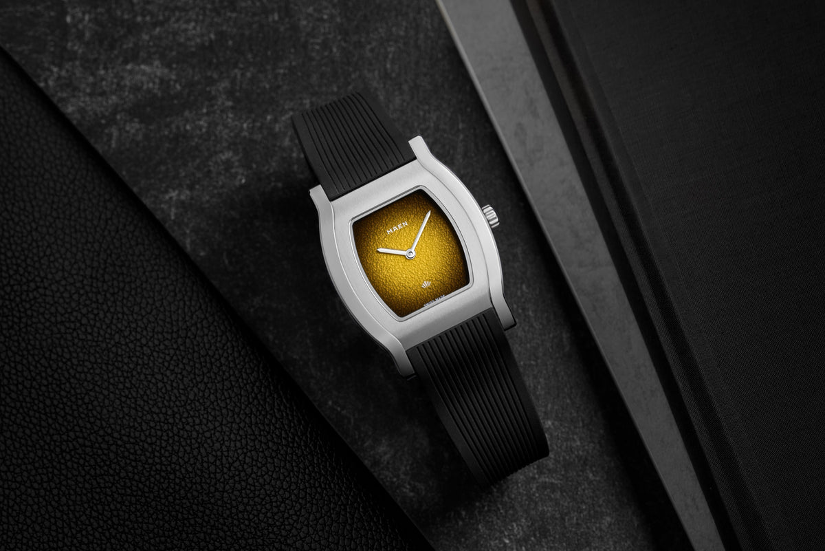 Grand Tonneau Ultra-Thin MNL.08 Yellow Fumé on its rubber strap